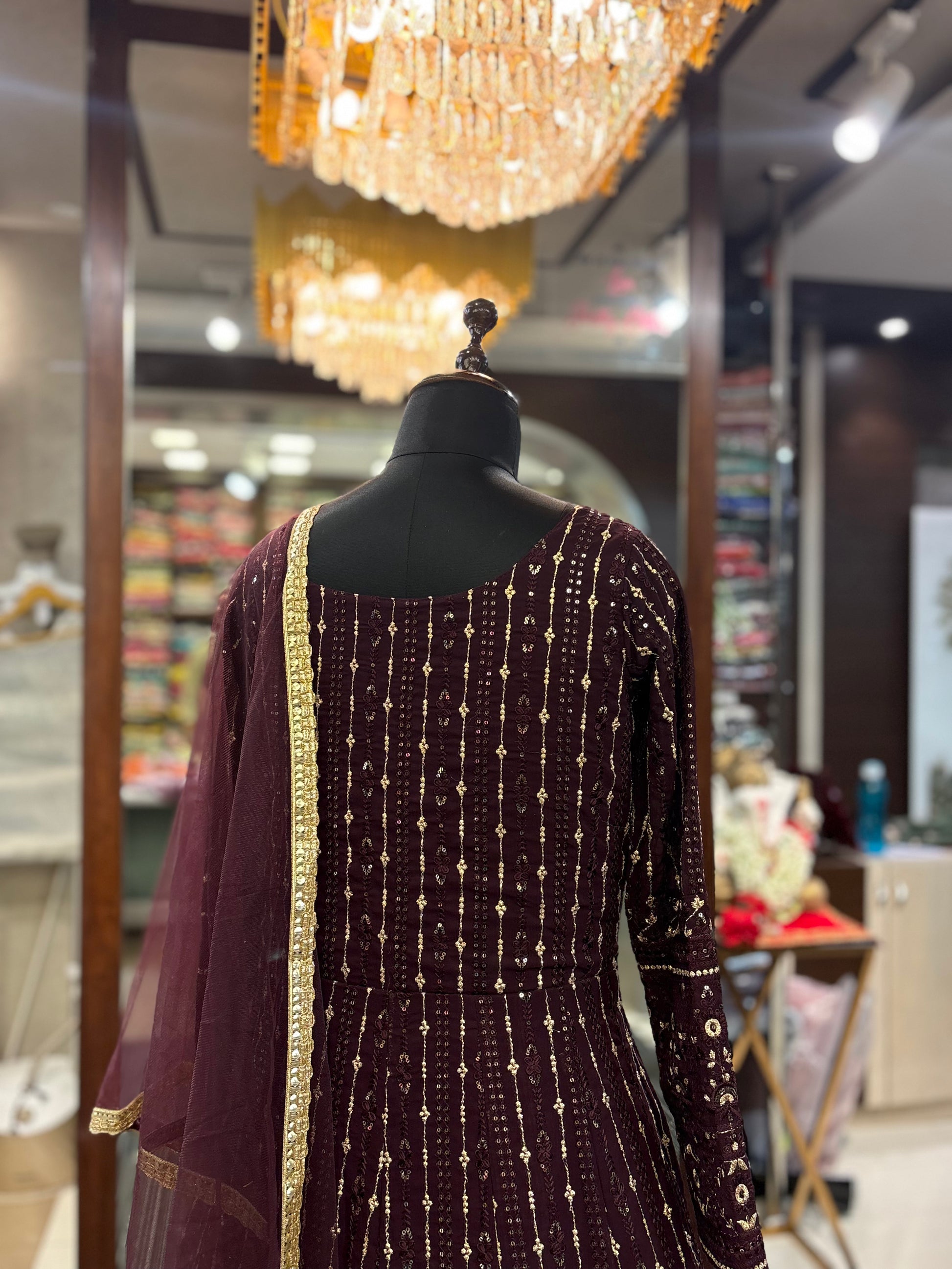 purple gown with sequin detailing and net dupatta